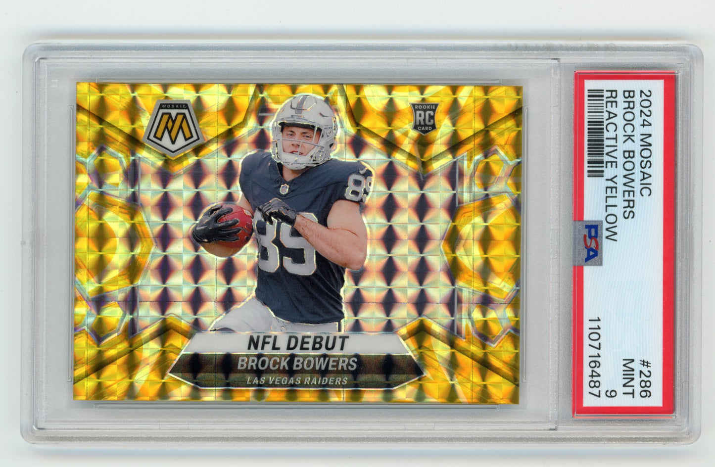 2024 Panini Mosaic Brock Bowers NFL Debut RC #286 - Reactive Yellow PSA 9 Raiders