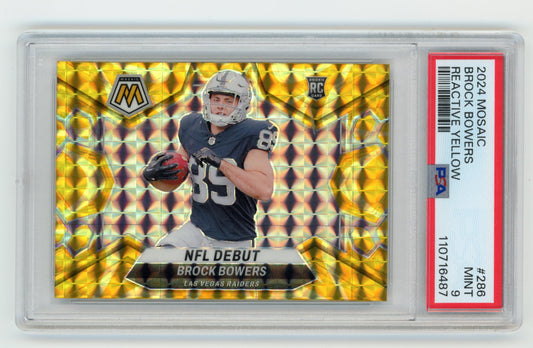 2024 Panini Mosaic Brock Bowers NFL Debut RC #286 - Reactive Yellow PSA 9 Raiders