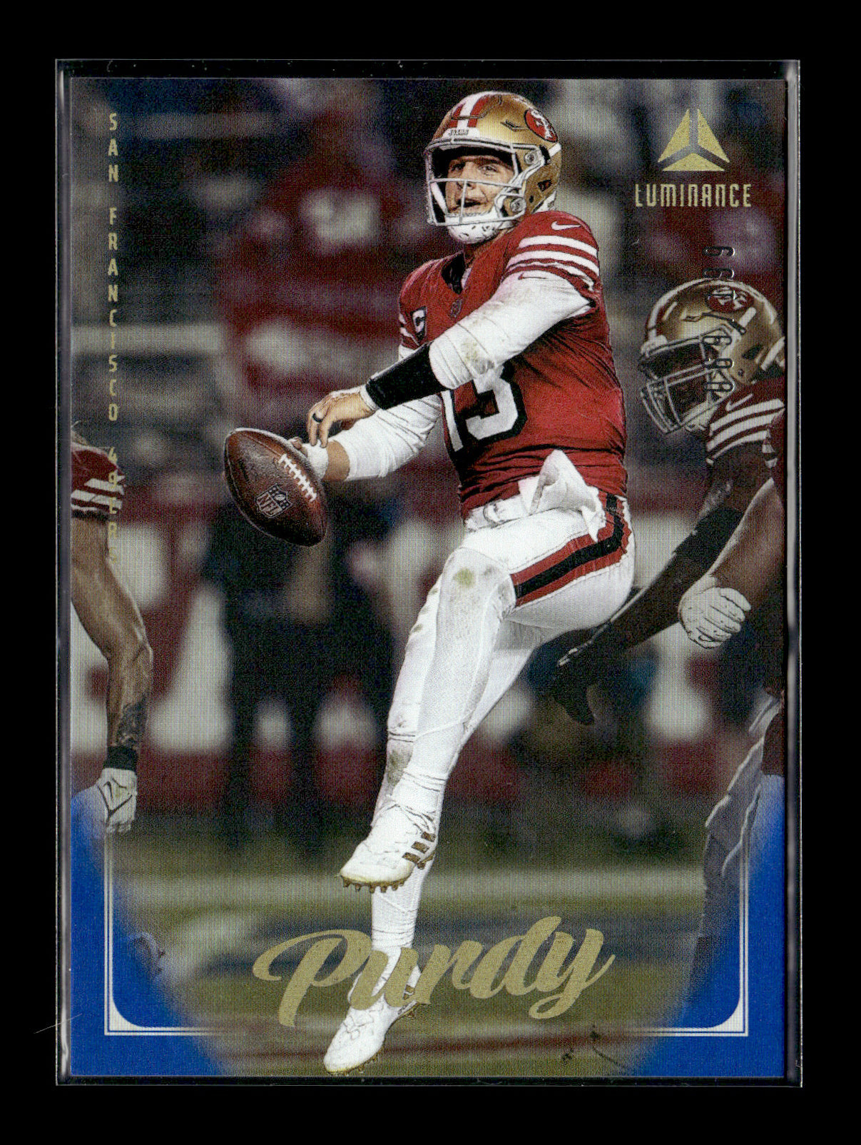 2025 Panini Luminance Brock Purdy #23 Blue #/199 San Francisco 49ers