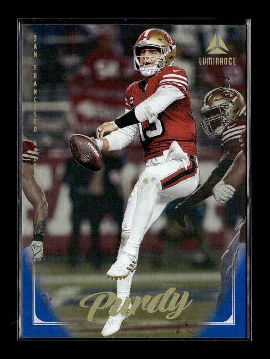 2025 Panini Luminance Brock Purdy #23 Blue #/199 San Francisco 49ers